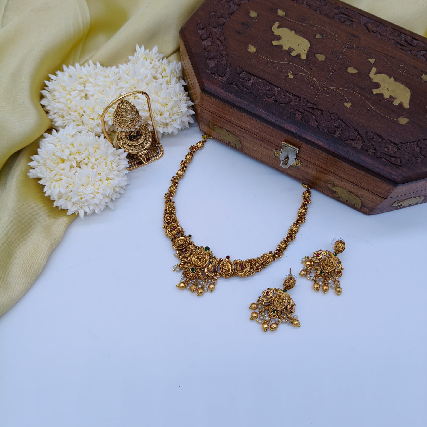 Gold mayura necklace